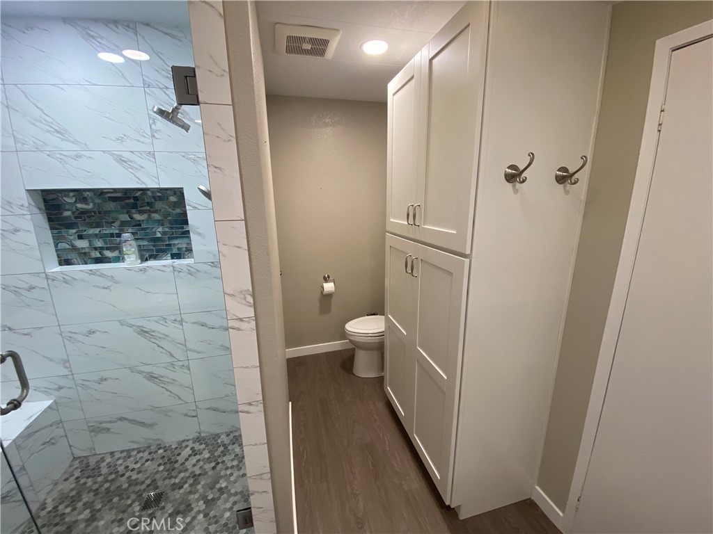 193 Rancho Adolfo Drive Camarillo, CA 93012 - Photo 19 of 43 a bathroom with a shower and a toilet