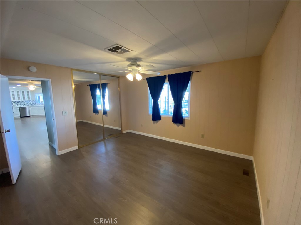 193 Rancho Adolfo Drive Camarillo, CA 93012 - Photo 20 of 43 an empty room with wooden floor and windows
