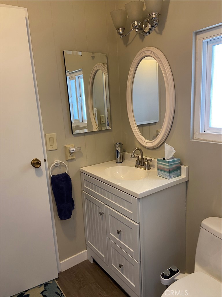 193 Rancho Adolfo Drive Camarillo, CA 93012 - Photo 23 of 43 a bathroom with a granite countertop toilet sink and mirror