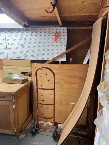 a view of swimming pool with seating space