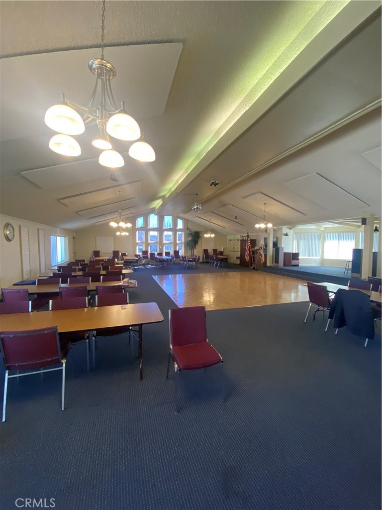 193 Rancho Adolfo Drive Camarillo, CA 93012 - Photo 36 of 43 a room with lots of furniture and a chandelier