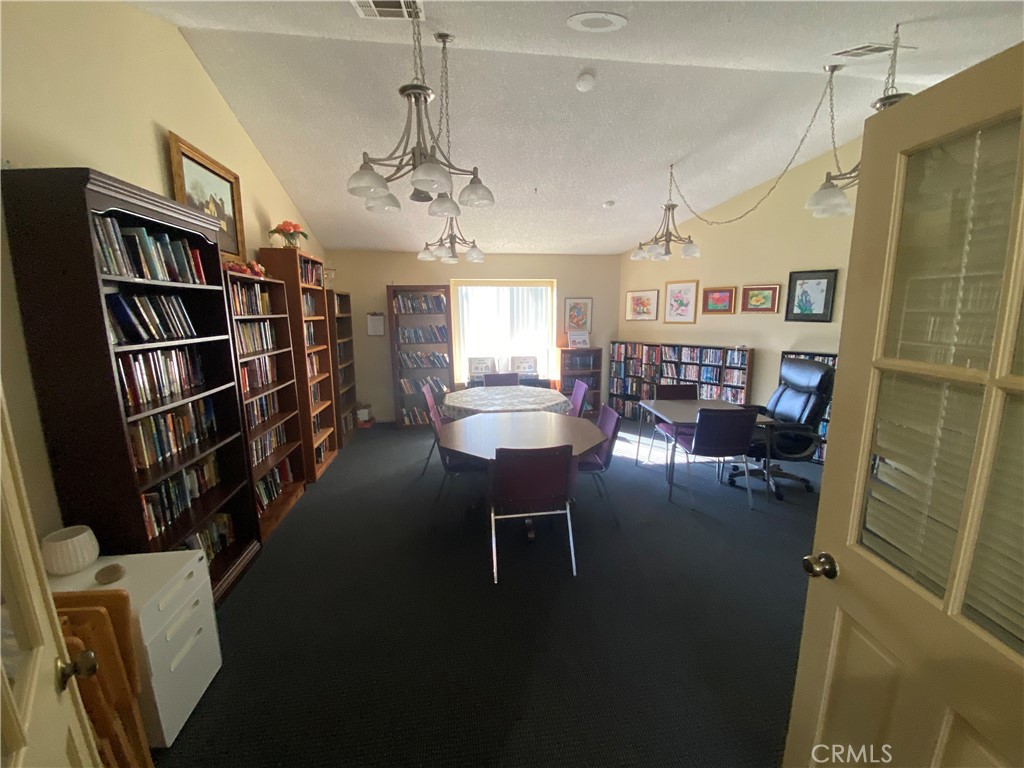 193 Rancho Adolfo Drive Camarillo, CA 93012 - Photo 37 of 43 a view of a livingroom with furniture and a book shelf