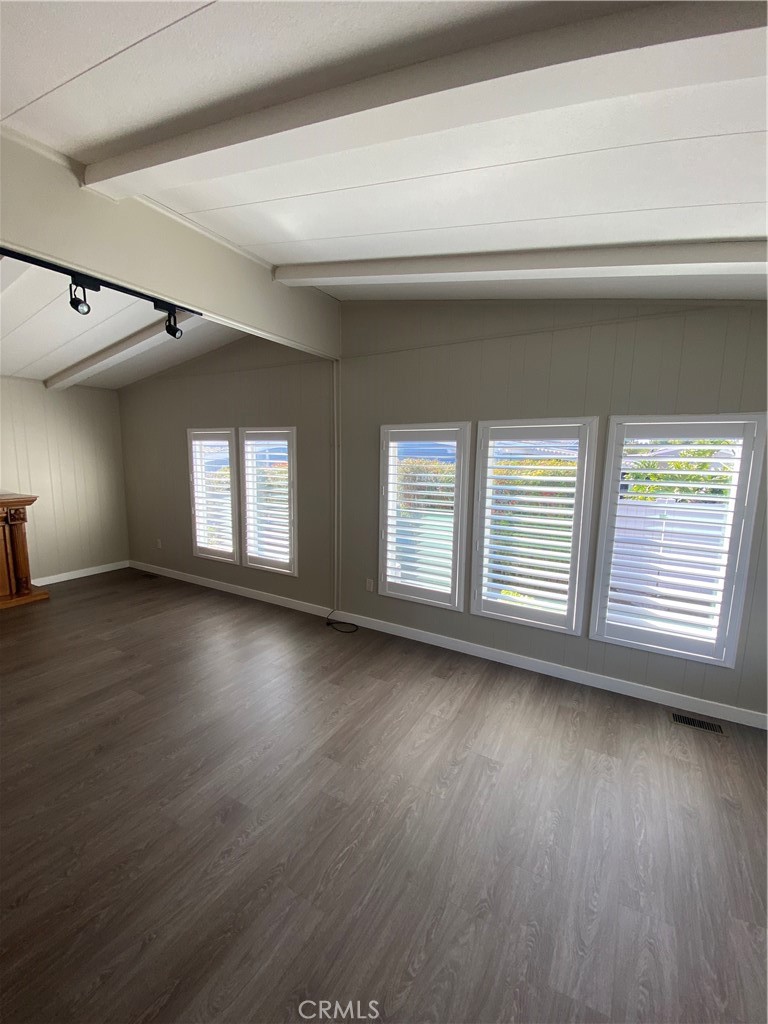 193 Rancho Adolfo Drive Camarillo, CA 93012 - Photo 4 of 43 an empty room with wooden floor and windows