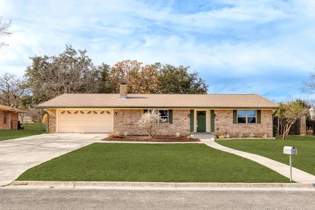 front view of house with a yard