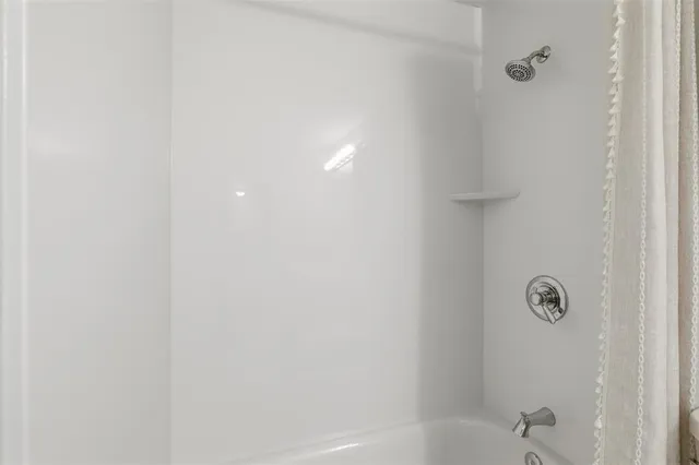 a bathroom with a bathtub