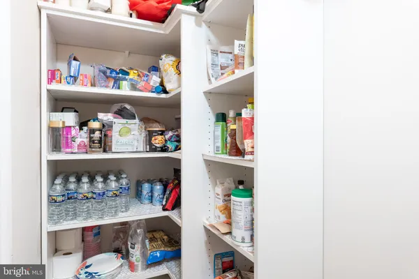 a room with toys and a book shelf