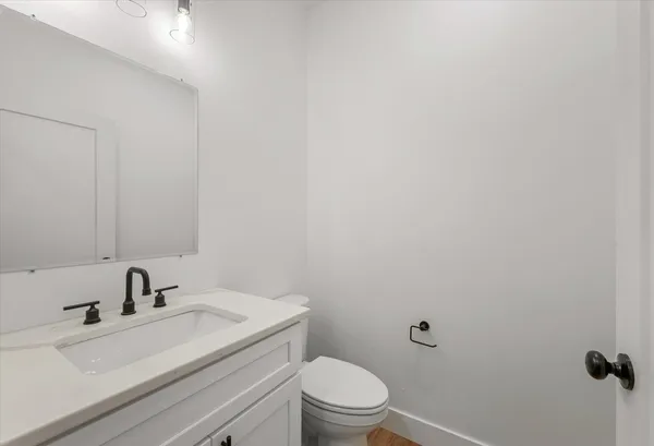 a bathroom with a sink and a toilet
