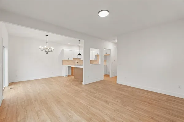a view of kitchen with wooden floor