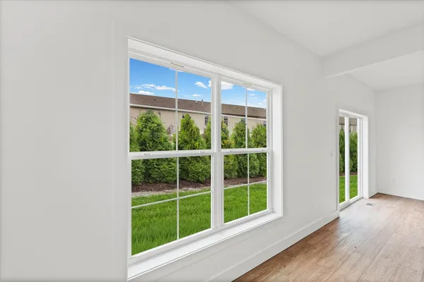a view of a room that has a large window