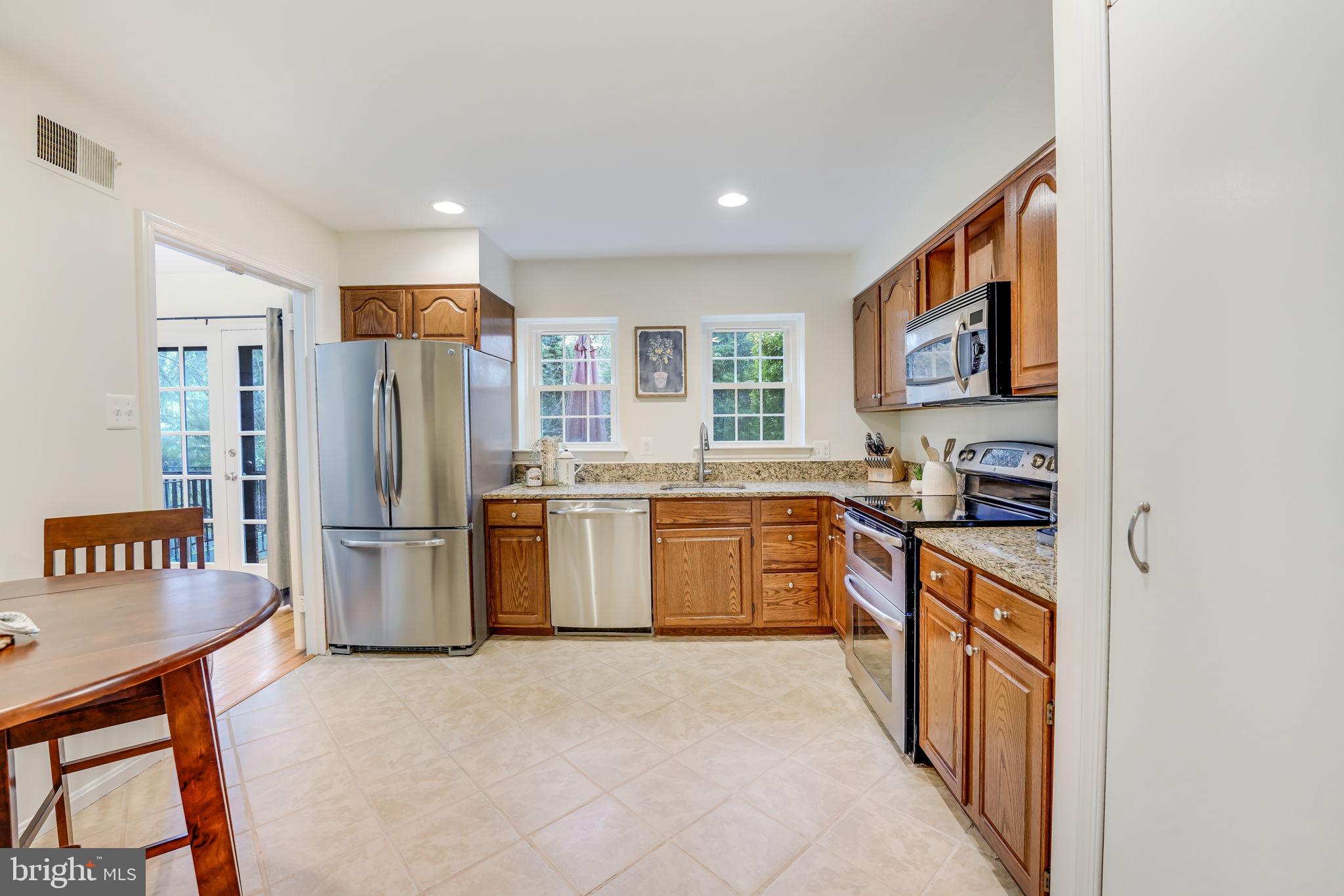 2111 Golf Course Drive Reston, VA 20191 - Photo 11 of 34 Stainless Appliance, Granite Counters
