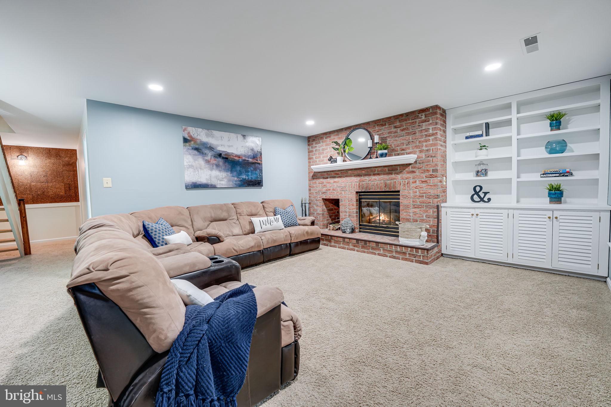 2111 Golf Course Drive Reston, VA 20191 - Photo 22 of 34 Lower Level Rec Room w/Wood Burning Fireplace