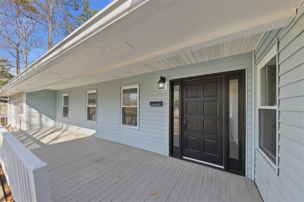 8976 Ochil Lane Winston, GA 30187 - Photo 4 of 53 a view of a house with wooden floor