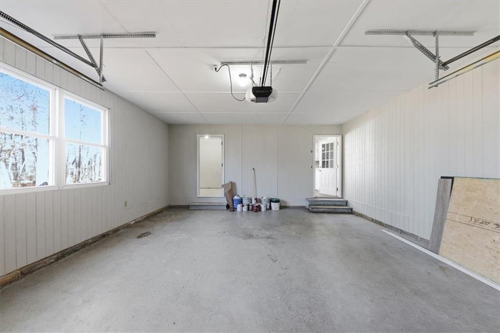8976 Ochil Lane Winston, GA 30187 - Photo 42 of 53 a view of an empty room with a window
