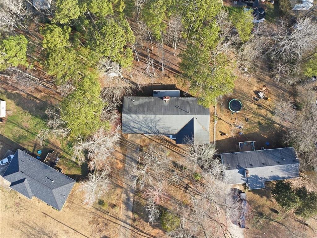 8976 Ochil Lane Winston, GA 30187 - Photo 48 of 53 a view of a house with a yard