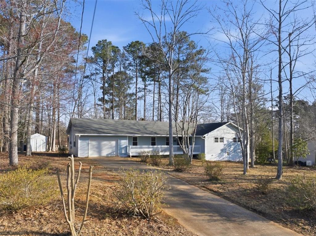 8976 Ochil Lane Winston, GA 30187 - Photo 49 of 53 a front view of a house with a yard