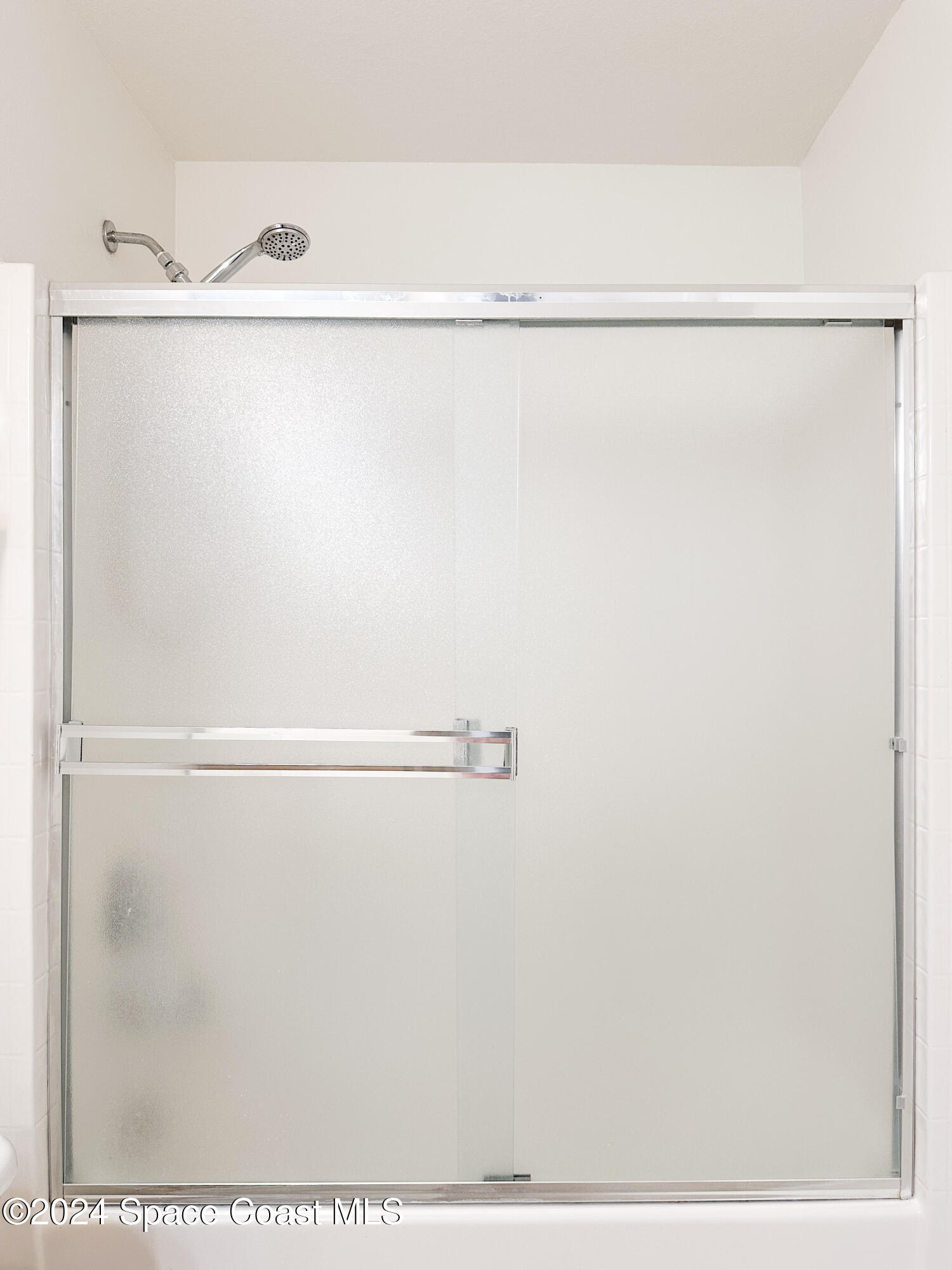 152 Morgan Circle Sebastian, FL 32958 - Photo 27 of 64 a picture of a bathroom with a shower