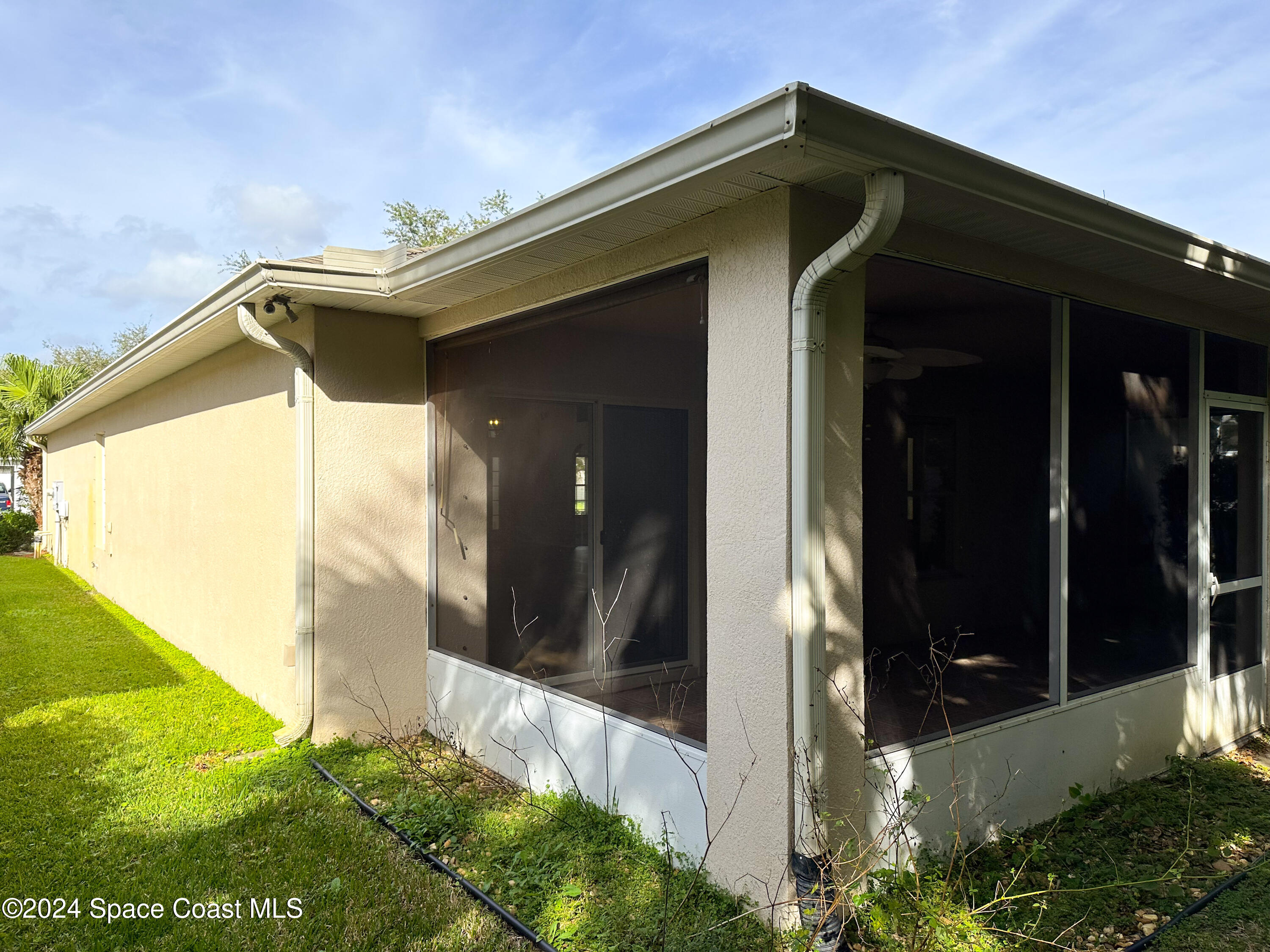 152 Morgan Circle Sebastian, FL 32958 - Photo 44 of 64 a front view of a house with a yard