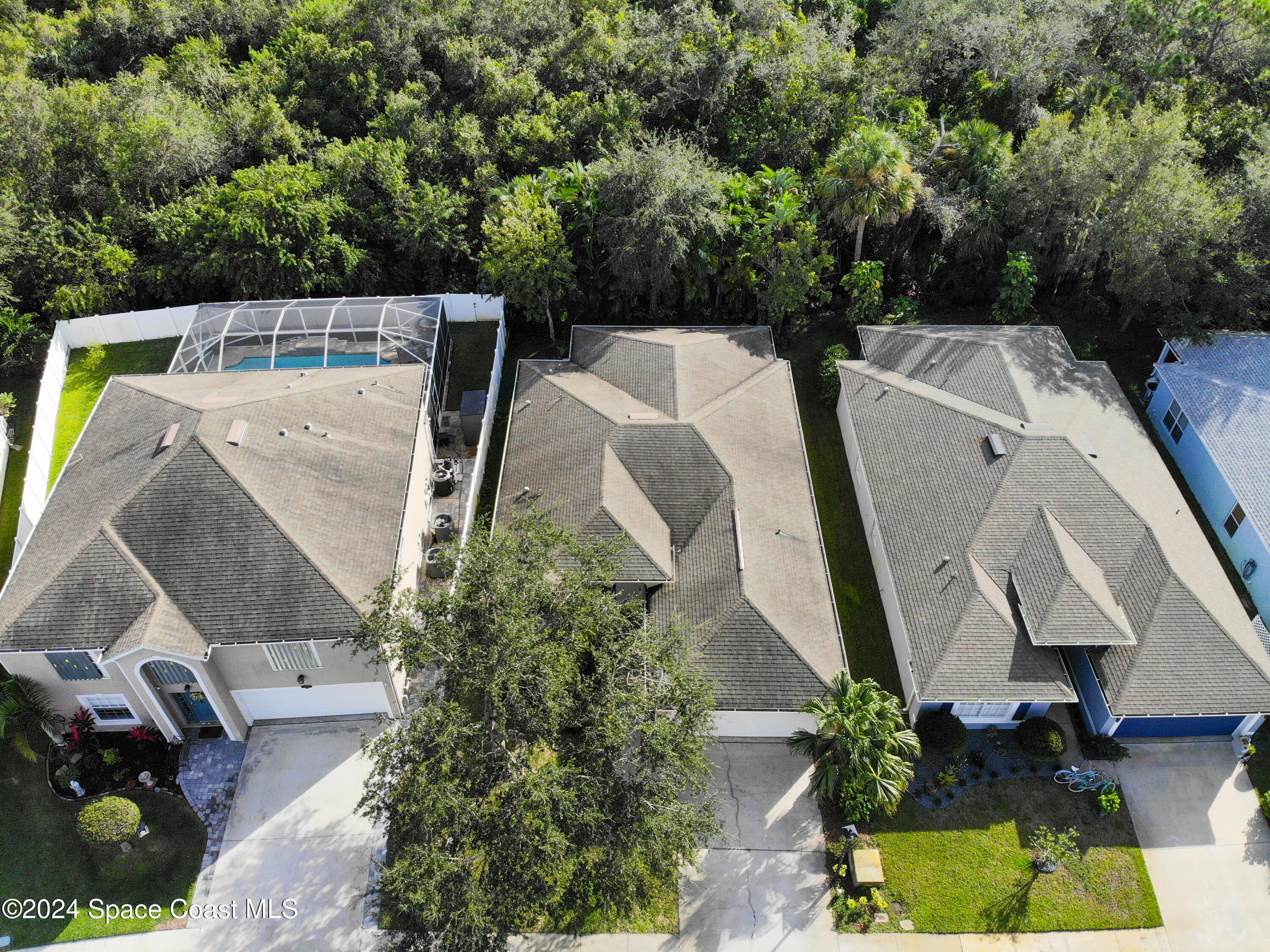 152 Morgan Circle Sebastian, FL 32958 - Photo 52 of 64 an aerial view of a house with a yard