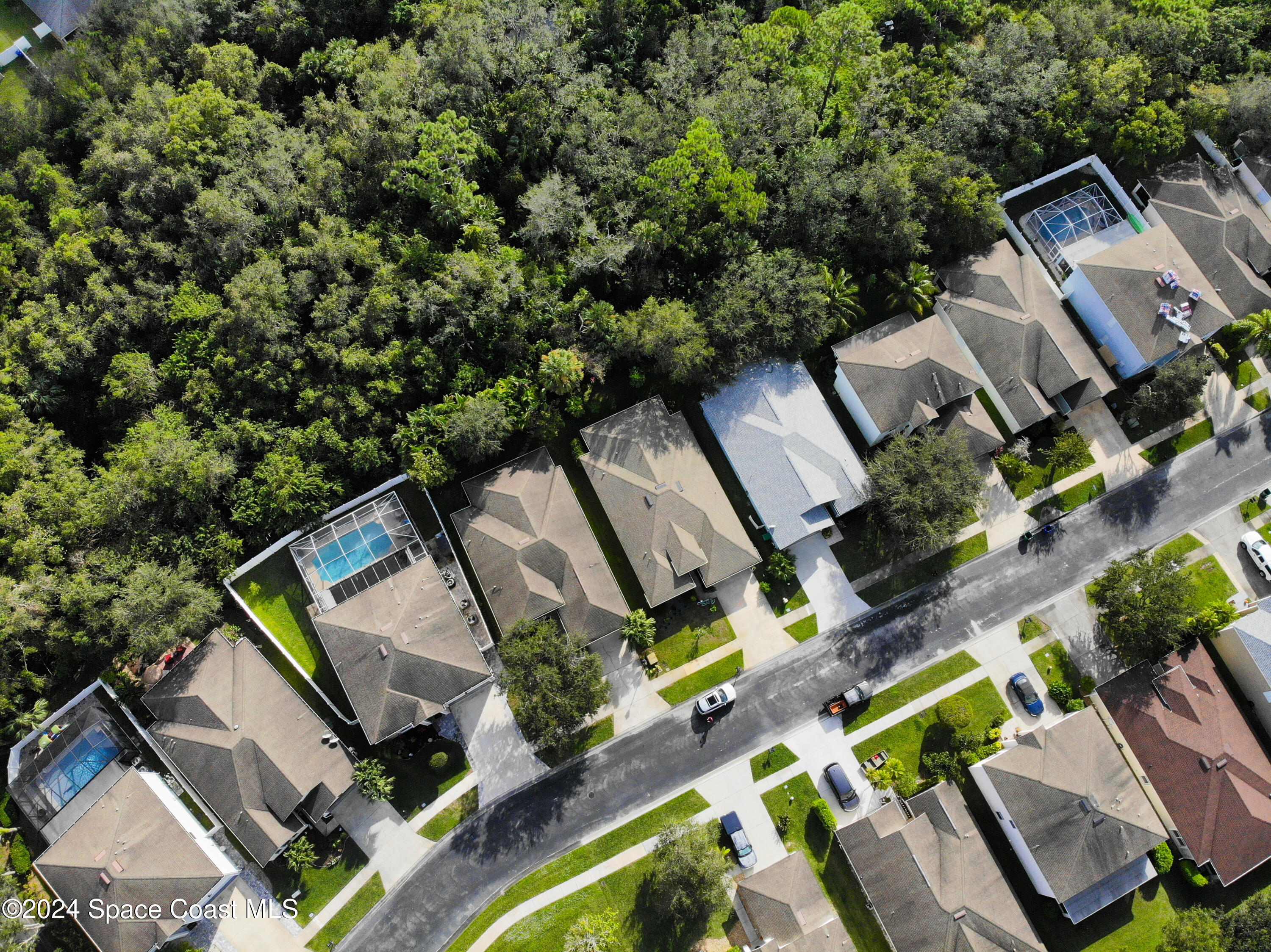 152 Morgan Circle Sebastian, FL 32958 - Photo 61 of 64 an aerial view of multiple houses with yard