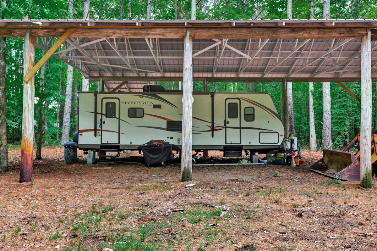 1218 Johnson Branch Road Pulaski, TN 38478 - Photo 18 of 23 a view of outdoor space with seating area and trees