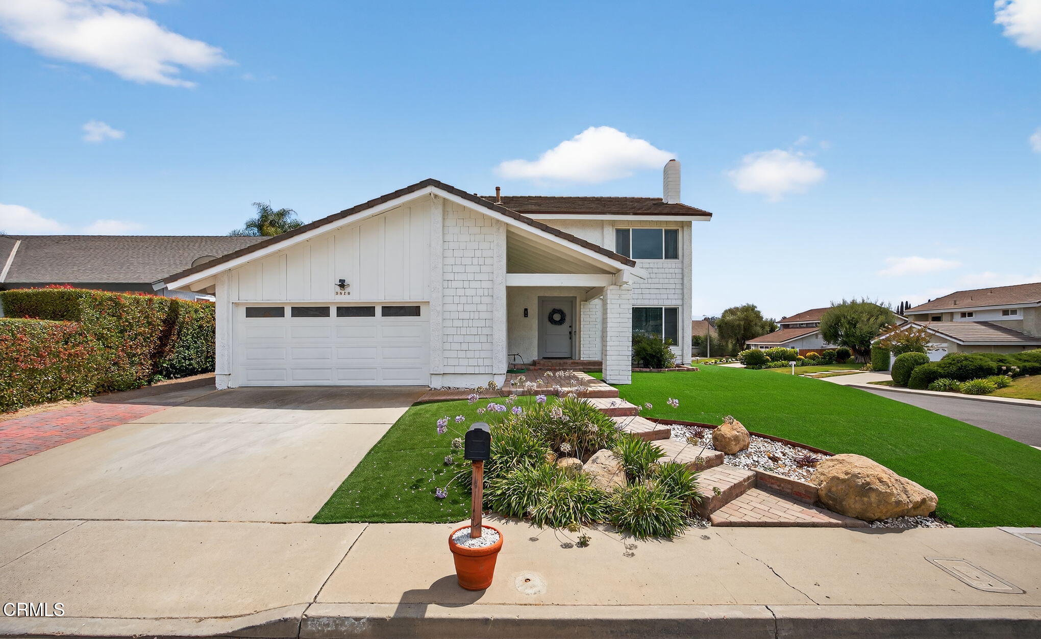 3470 Chief Circle Thousand Oaks, CA 91360 - Photo 1 of 26 a front view of a house with a yard