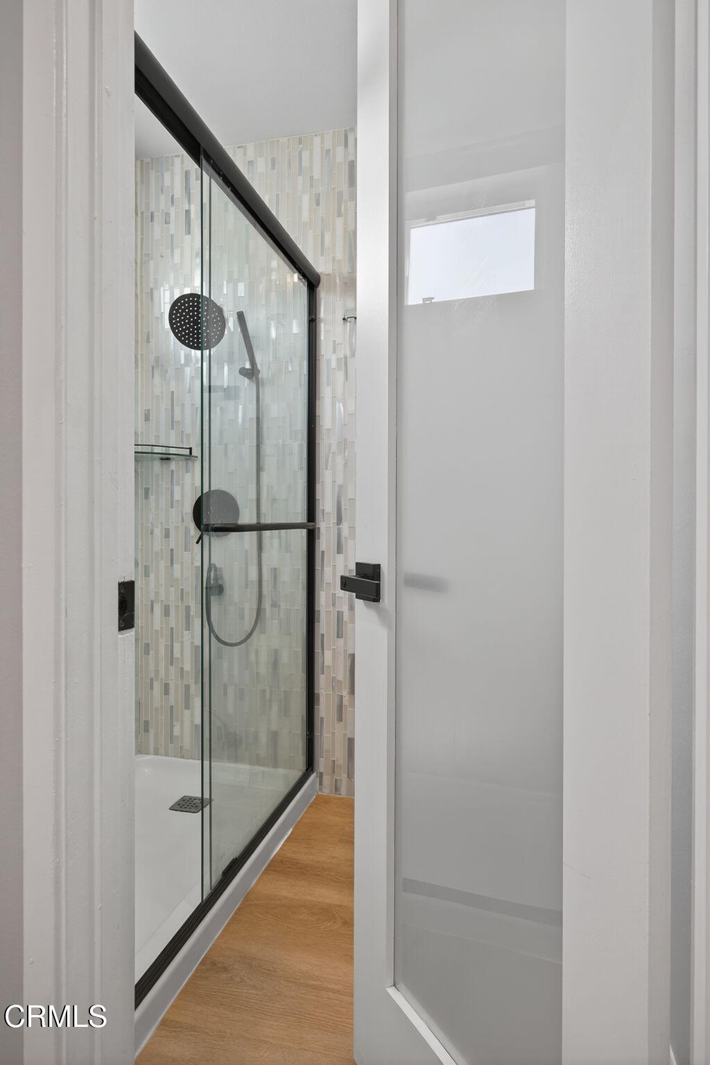 3470 Chief Circle Thousand Oaks, CA 91360 - Photo 17 of 26 a bathroom with a glass shower door