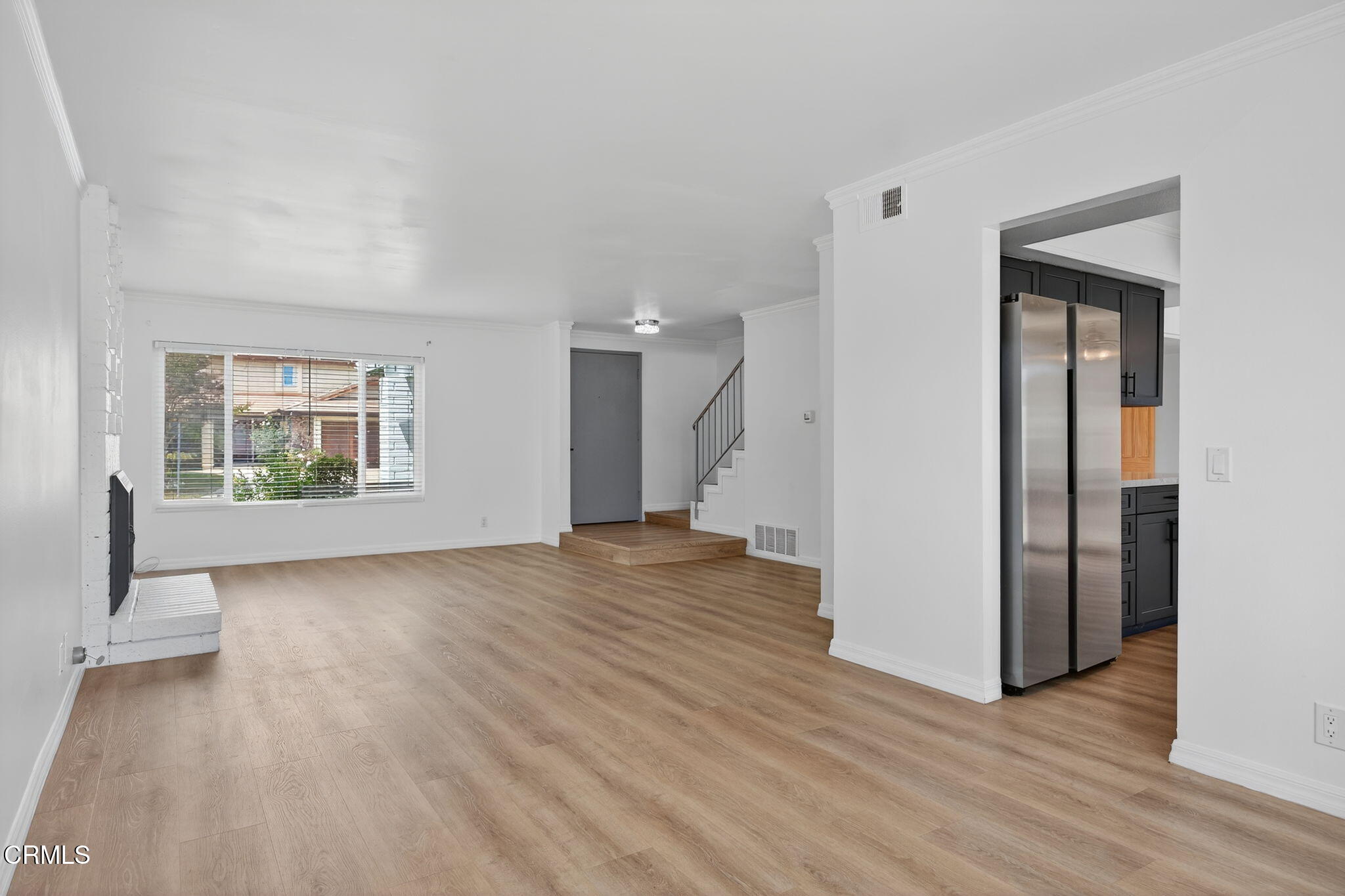 3470 Chief Circle Thousand Oaks, CA 91360 - Photo 5 of 26 an empty room with wooden floor and windows