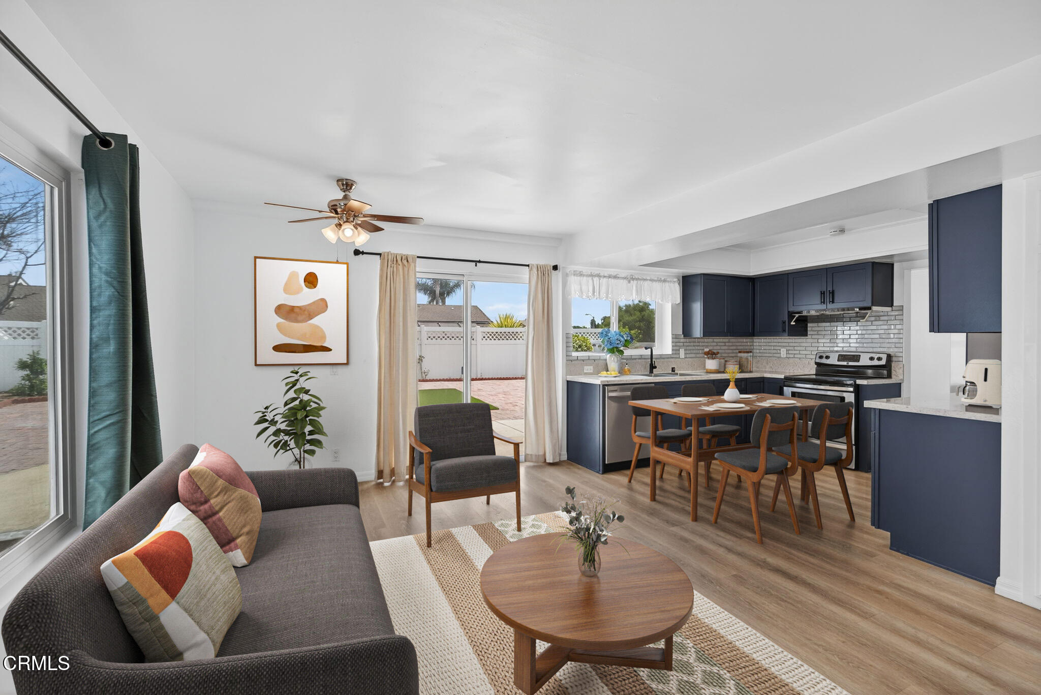 3470 Chief Circle Thousand Oaks, CA 91360 - Photo 8 of 26 a living room with furniture kitchen view and a large window