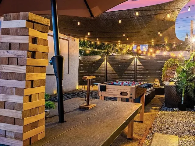 a view of gym equipment and outdoor seating