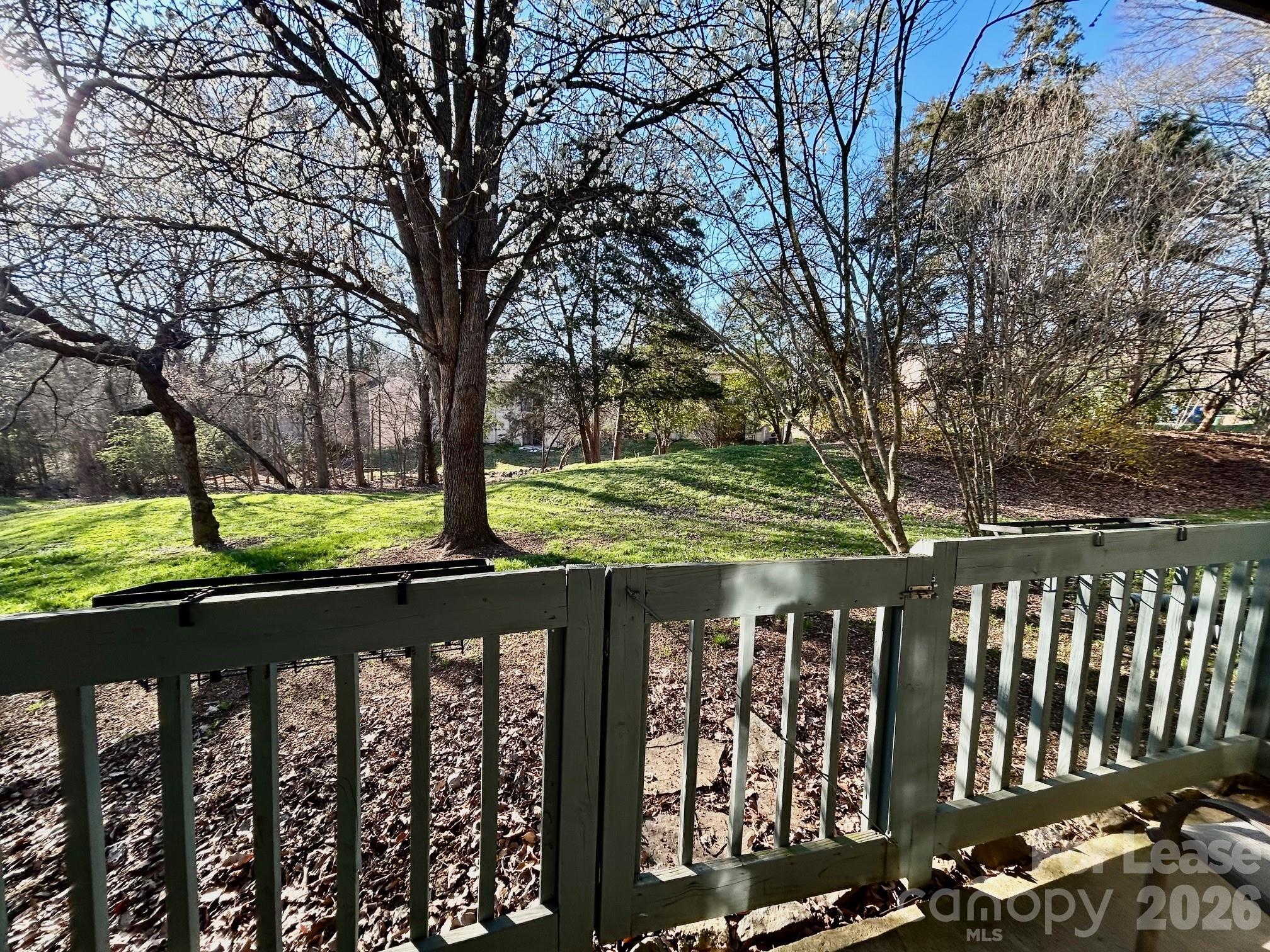 a view of a wooden street from a balcony
