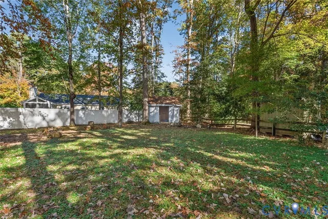 a house with trees in the background