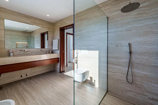 a view of an empty room with windows