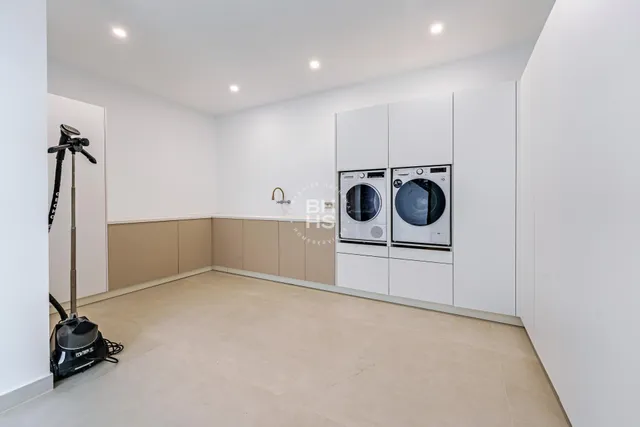 a view of potted plants with glass windows