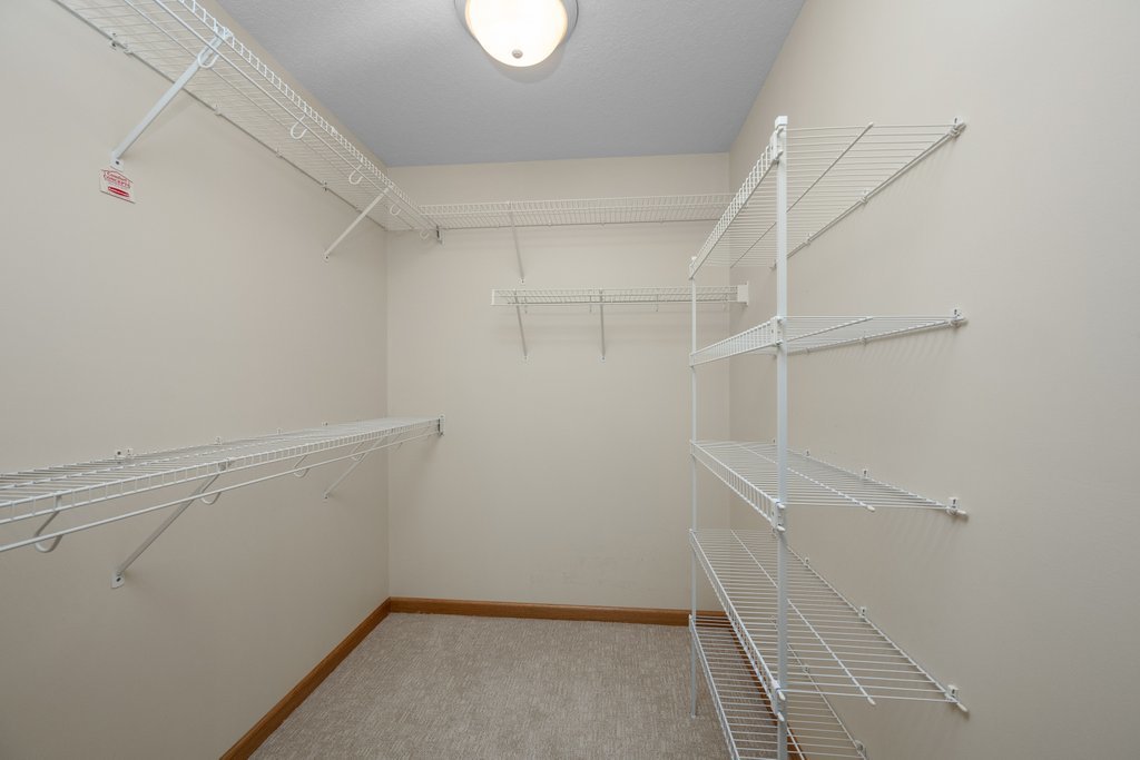 1126 West Le Claire Road Eldridge, IA 52748 - Photo 17 of 44 a view of an empty walk in closet