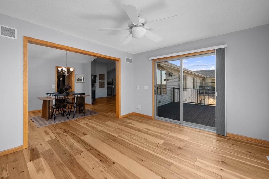 1126 West Le Claire Road Eldridge, IA 52748 - Photo 21 of 44 a view of a room with wooden floor and furniture