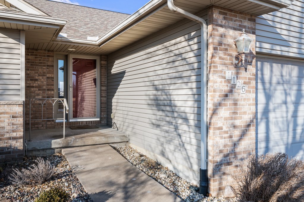 1126 West Le Claire Road Eldridge, IA 52748 - Photo 3 of 44 a view of entryway of a house