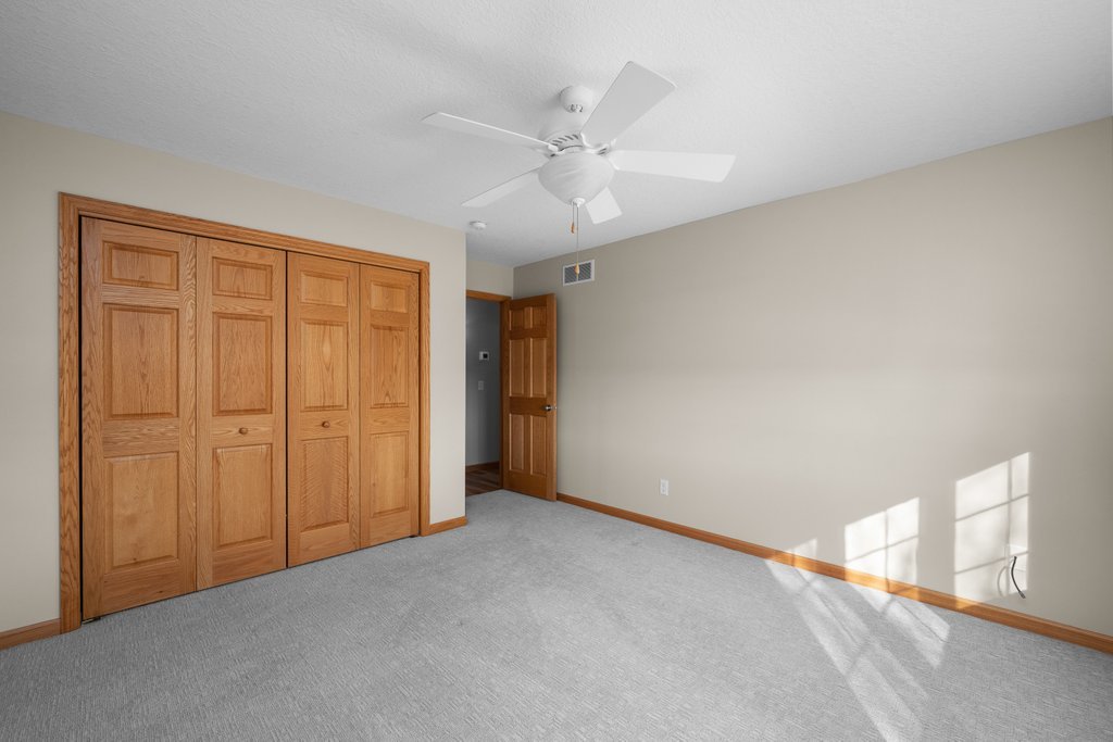 1126 West Le Claire Road Eldridge, IA 52748 - Photo 31 of 44 a view of an empty room with a window