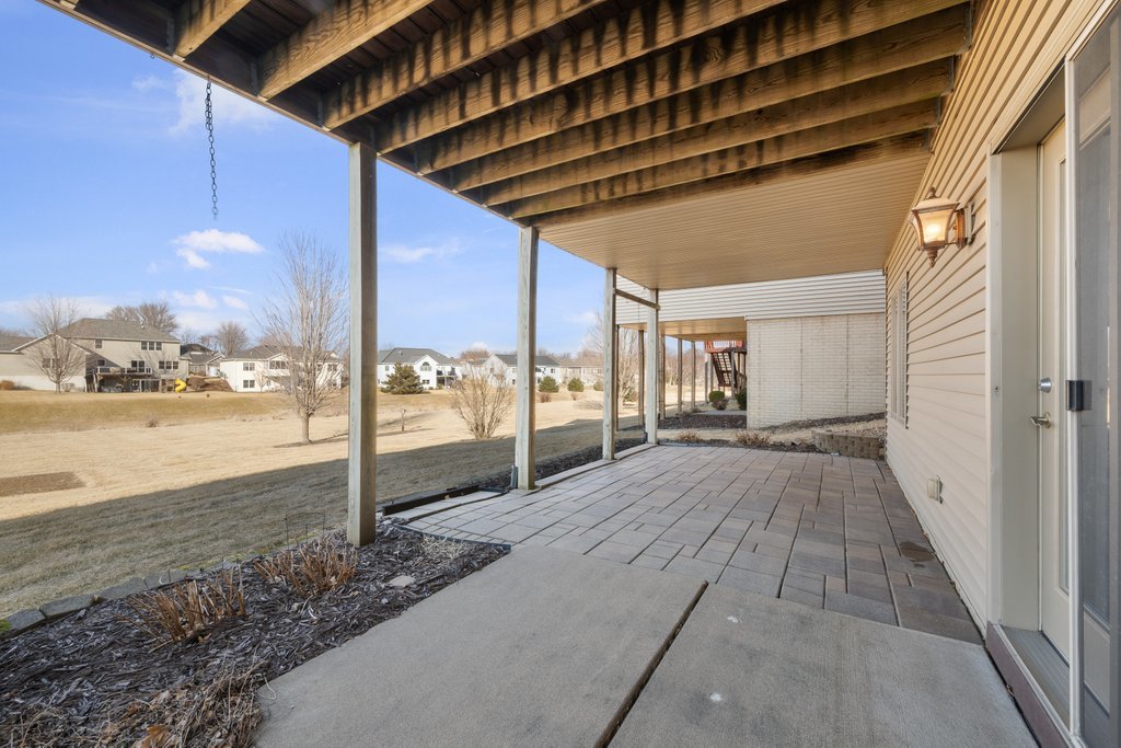 1126 West Le Claire Road Eldridge, IA 52748 - Photo 39 of 44 a view of a porch
