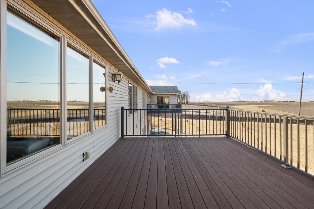 1126 West Le Claire Road Eldridge, IA 52748 - Photo 42 of 44 a view of a balcony with wooden floor