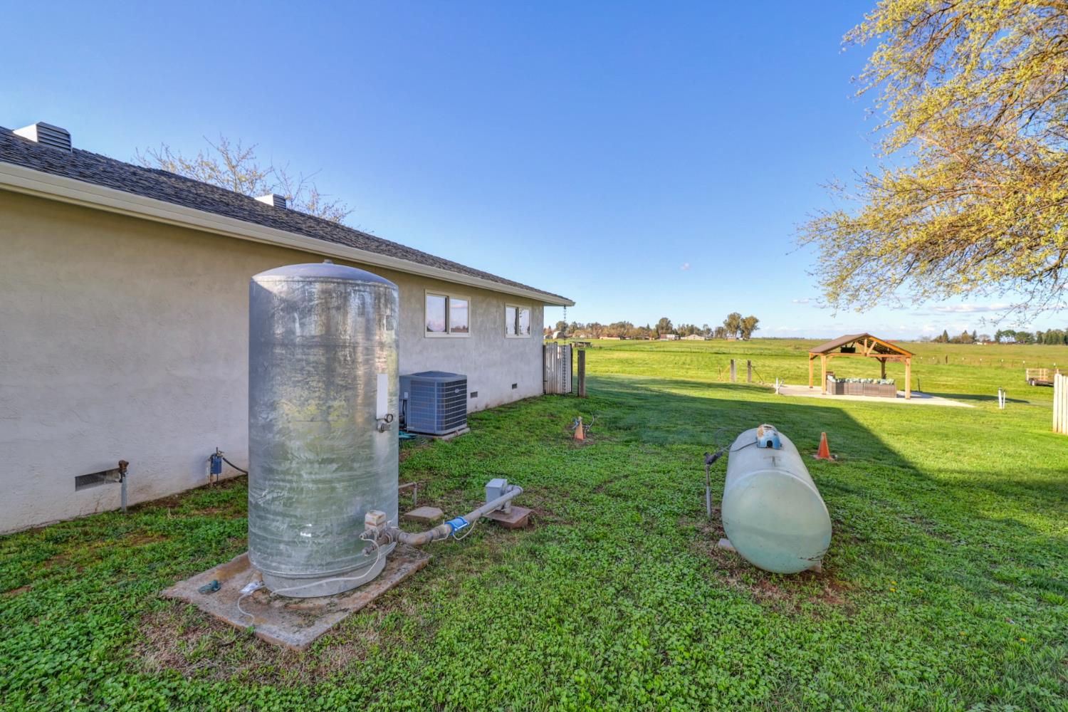 10691 Calvine Road Sacramento, CA 95830 - Photo 42 of 47 a view of a house with a backyard and a patio