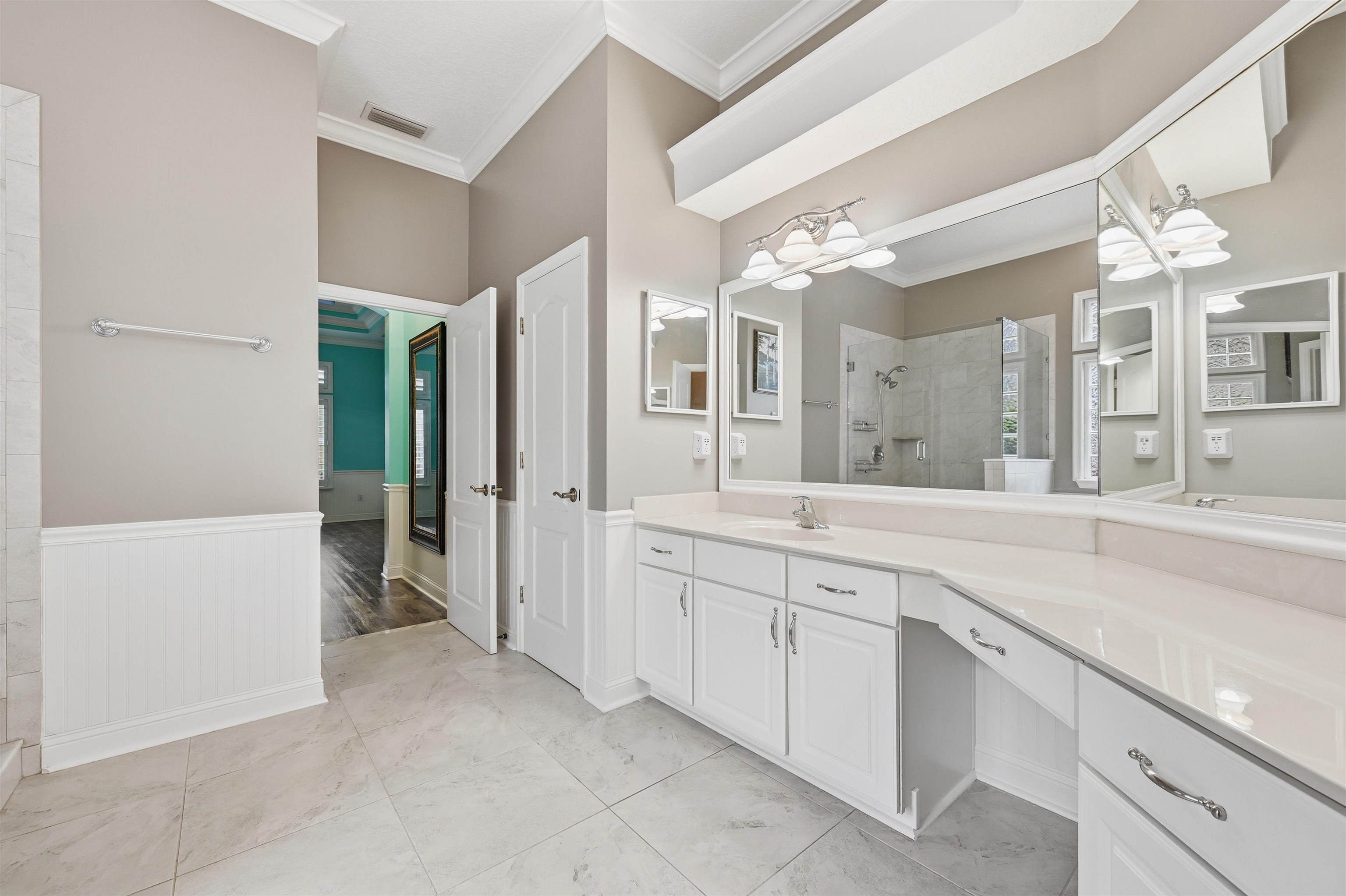 121 Edge Of Woods Road St. Augustine, FL 32092 - Photo 21 of 53 a spacious bathroom with a shower and a sink