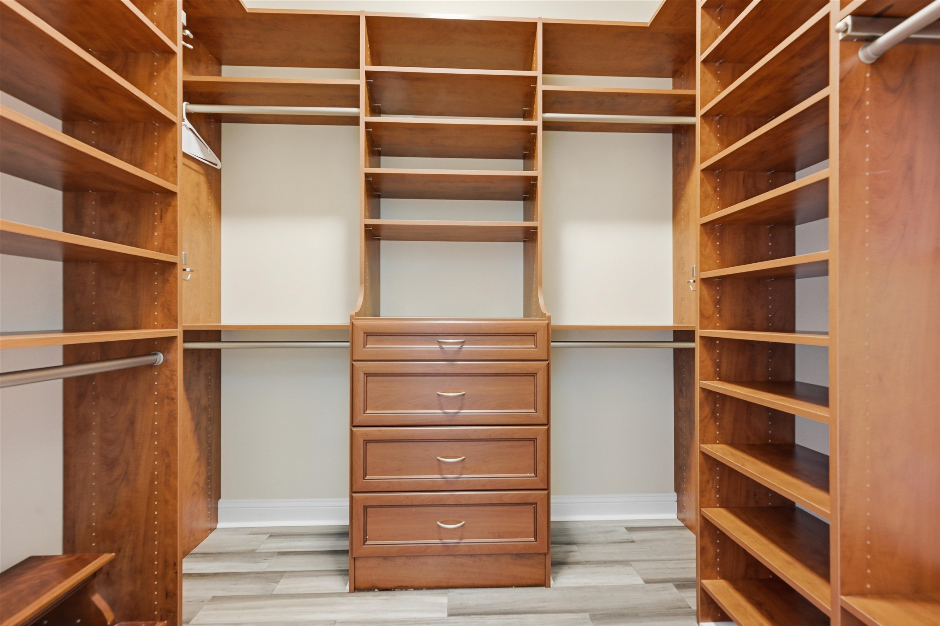 121 Edge Of Woods Road St. Augustine, FL 32092 - Photo 24 of 53 a view of walk in closet with empty racks