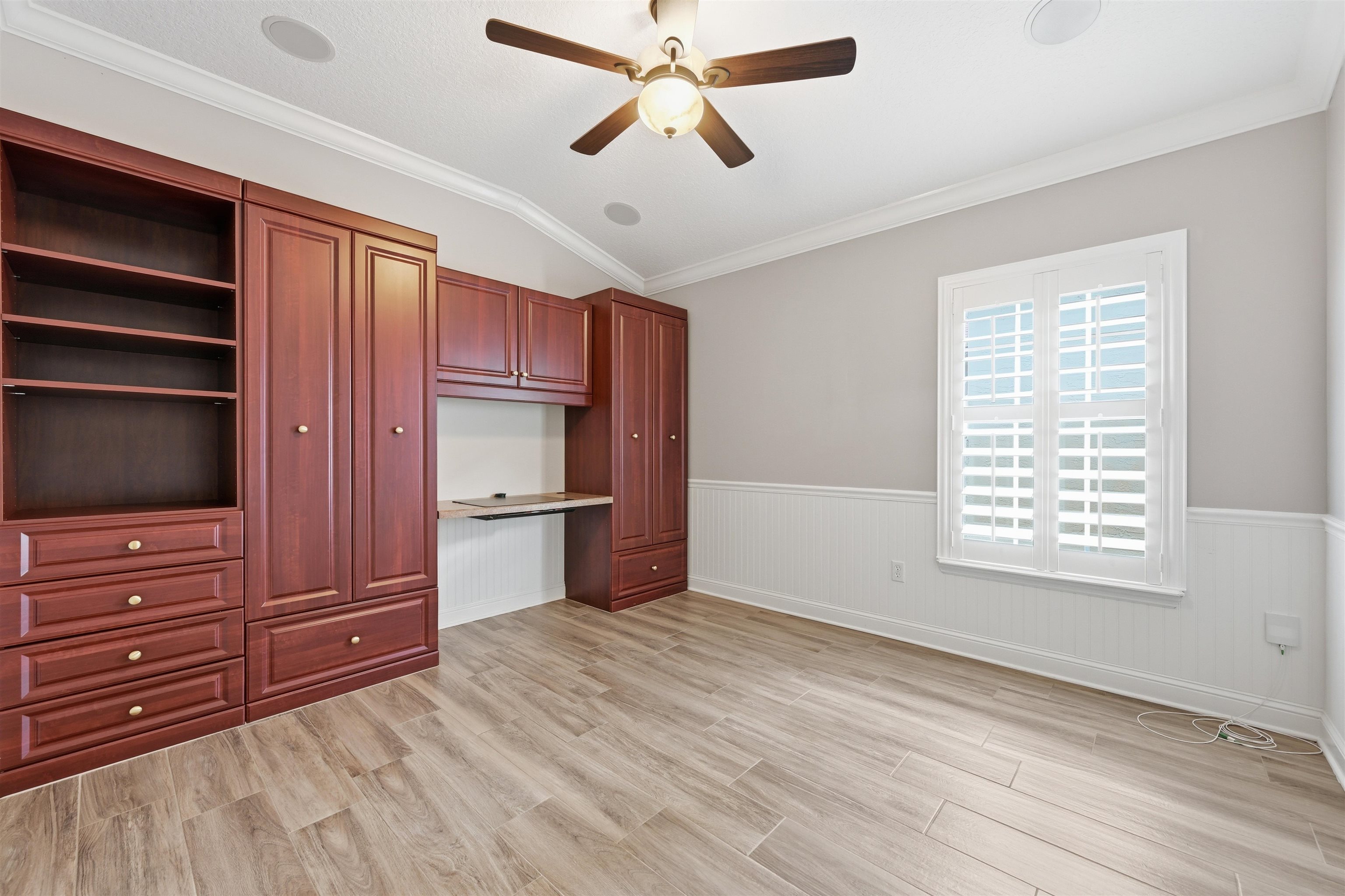 121 Edge Of Woods Road St. Augustine, FL 32092 - Photo 33 of 53 a view of a livingroom with a dishwasher and a ceiling fan