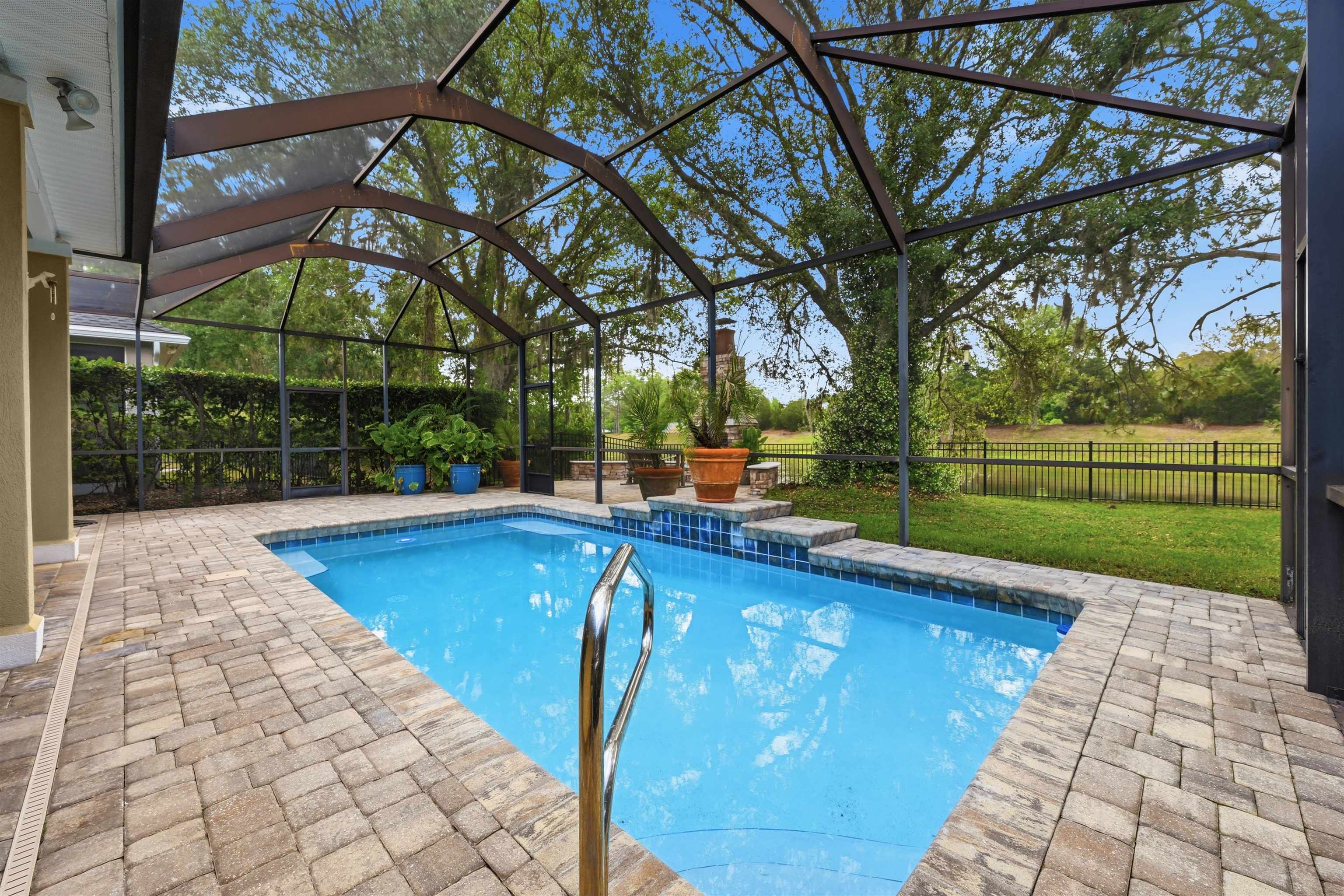 121 Edge Of Woods Road St. Augustine, FL 32092 - Photo 36 of 53 a view of swimming pool with a patio