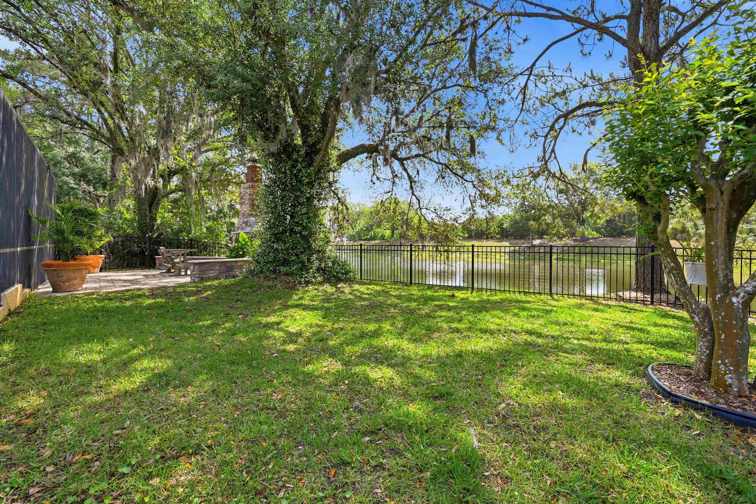 121 Edge Of Woods Road St. Augustine, FL 32092 - Photo 44 of 53 a view of a yard with a tree