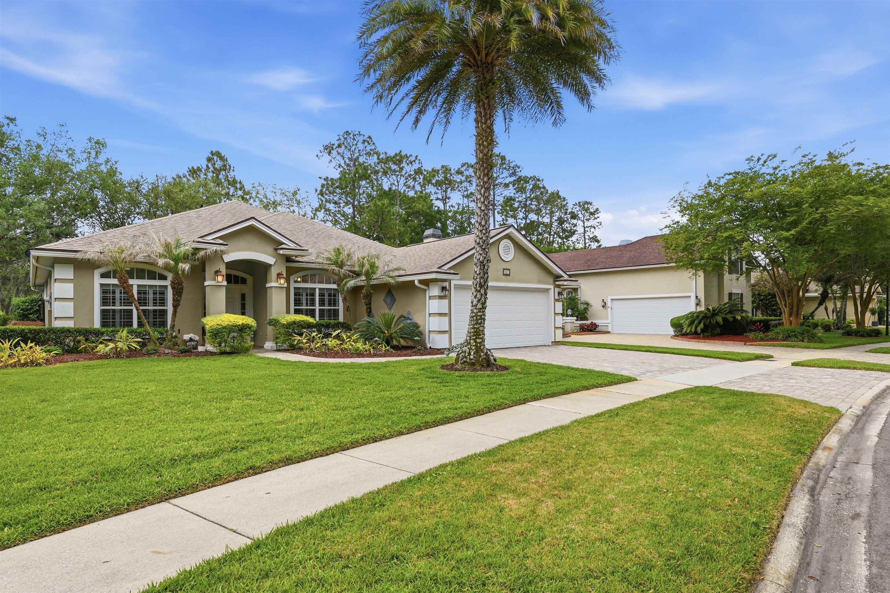 121 Edge Of Woods Road St. Augustine, FL 32092 - Photo 47 of 53 a front view of house with yard and green space