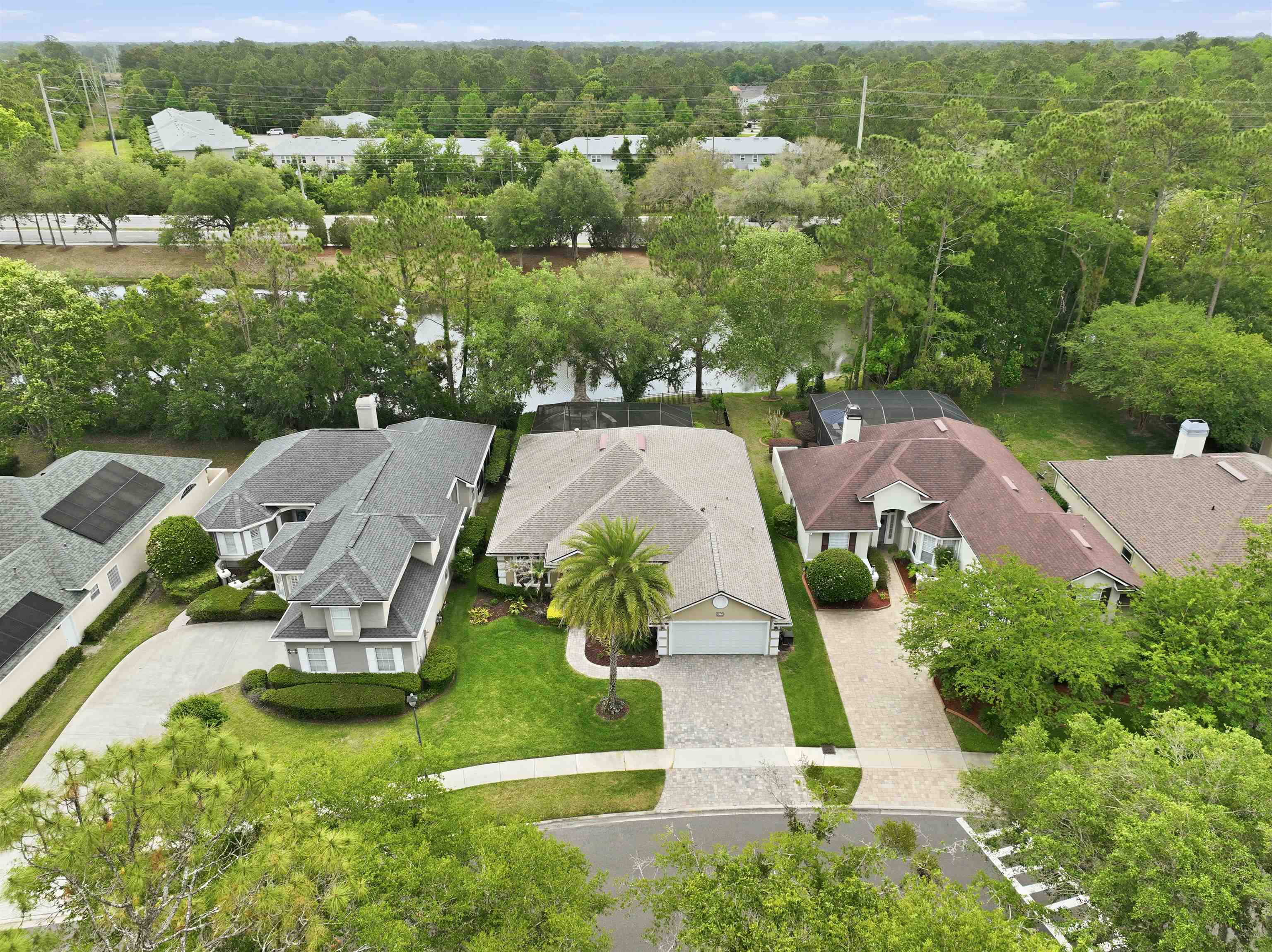 121 Edge Of Woods Road St. Augustine, FL 32092 - Photo 49 of 53 an aerial view of residential houses with outdoor space and parking