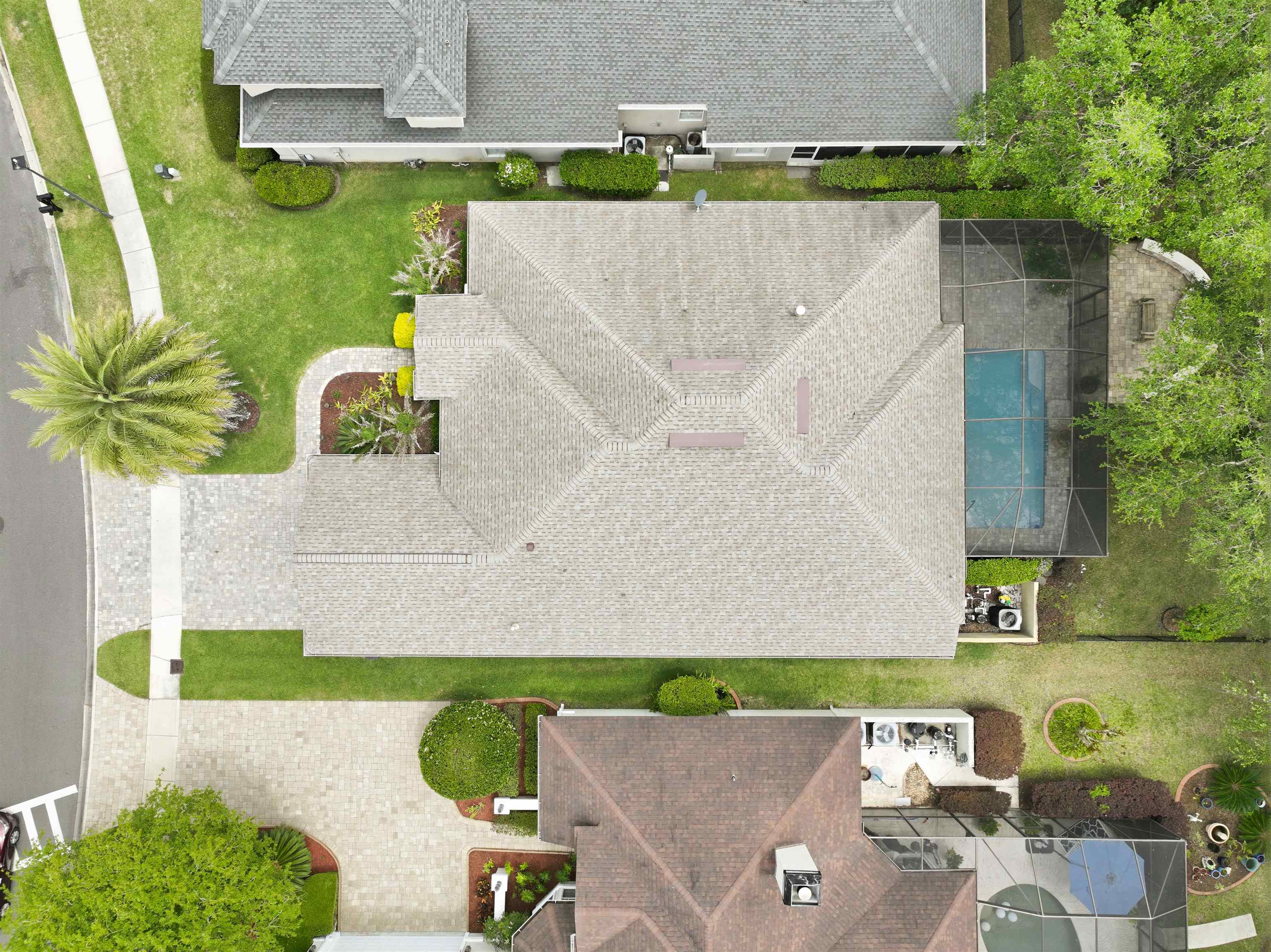 121 Edge Of Woods Road St. Augustine, FL 32092 - Photo 53 of 53 an aerial view of a house with a garden and swimming pool