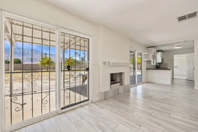 a view of livingroom with furniture and fireplace