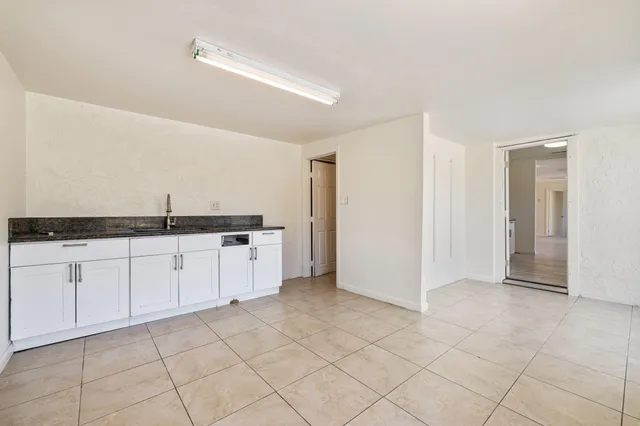 a bathroom with a toilet and a sink